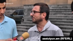 Armenia -- Dashnaktsutyun's Gegham Manukian talks to journalists outside a police station in Yerevan, June 4, 2019.