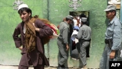 Afghan prisoners leave Nangarhar jail in Jalalabad in September.