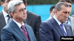 Armenia - President Serzh Sarkisian (L) and Surik Khachatrian, governor of Syunik province, attend an official ceremony.
