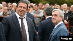 Armenia - President Serzh Sarkisian (R) and businessman Gagik Tsarukian attend the consecration of a new church built by Tsarukian in Abovian, 14May2013.