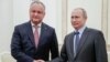 Russian President Vladimir Putin (right) meets with his Moldovan counterpart, Igor Dodon, at the Kremlin in Moscow in January.