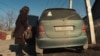 grab: kyrgyz female taxi service