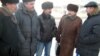 Члены инициативной группы шахтеров-инвалидов, подавшие в суд на корпорацию "Казахмыс", во главе с председателем НПО "Единство" Абильдой Абдикаримовым (второй справа). Караганда, 11 января 2012 года.