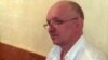 Подсудимый лидер партии "Алга" Владимир Козлов. 