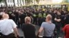 Желтые автобусы и полицейские кордоны разделили акцию националистов и антиоккупационный митинг на проспекте Руставели