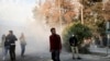 Iranian university students attend a protest inside Tehran University.