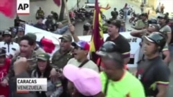 Chavez Supporters Mourn In Streets Of Caracas
