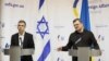 Israeli Foreign Minister Eli Cohen (left) and Ukrainian Foreign Minister Dmytro Kuleba attend a press conference in Kyiv on February 16. 