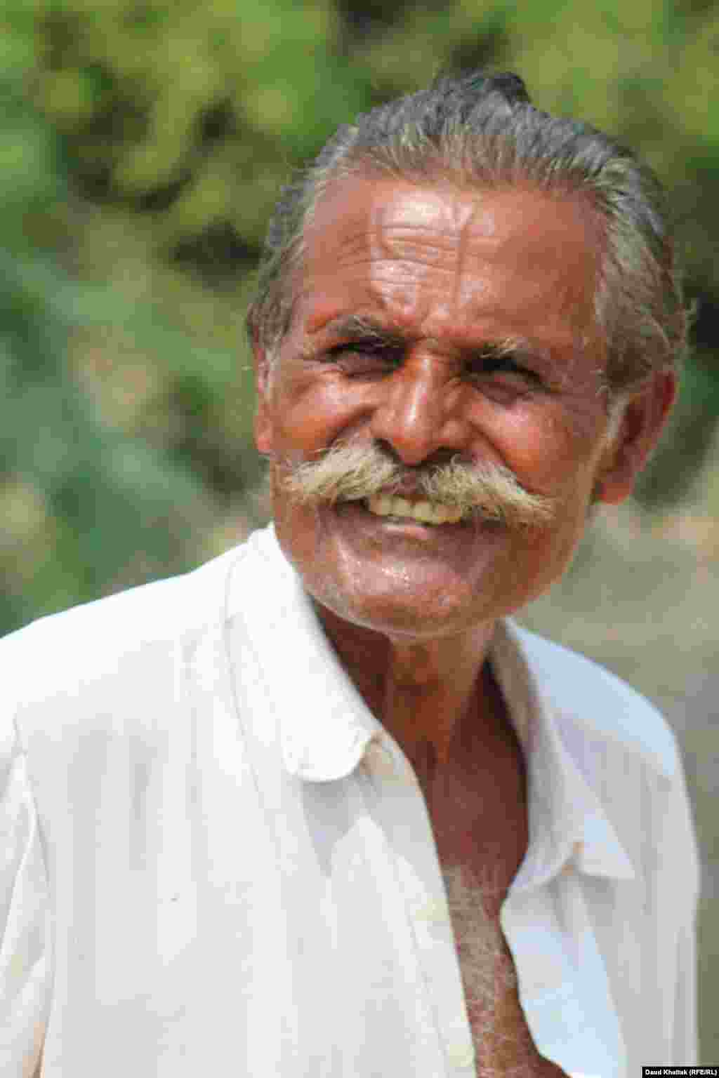 Kewal, Kallan Bibi’s husband, runs a makeshift shop in his village. “Life is hard here, but we are happy to stay because this is the land of our forefathers. We will never go anywhere.”