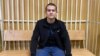 Ramil Shamsutdinov appears at his trial in a Chita courtroom on December 10.