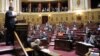 France -- Patrick Ollier (L), Parliamentary relations minister, speaks during the Senate vote session for a bill criminalizing the denial of the genocides, including the Armenian genocide, Paris, 23Jan2012
