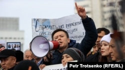 Zhanbolat Mamai speaks at a rally in memory of those killed during the January events, in Almaty in February 2022.