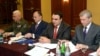 Armenia - Defense Minister Seyran Ohanian (second from left) and CSTO Secrtetary General Nikolay Bordyuzha (R) attend a conference in Yerevan, 26Jun2013.
