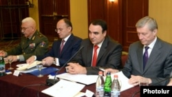 Armenia - Defense Minister Seyran Ohanian (second from left) and CSTO Secrtetary General Nikolay Bordyuzha (R) attend a conference in Yerevan, 26Jun2013.
