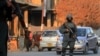 Afghan security officials stand guard at a checkpoint on the outskirts of Ghazni city. (file photo)