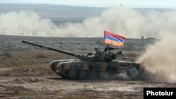 Armenia - An Armenian battle tank takes part in CSTO military exercises at the Marshal Bagramian shooting ground, 19Sep2012.