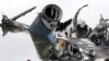 A rescue diver works next to the wreckage of the Yakovlev-42 passenger plane that crashed near the city of Yaroslavl, north of Moscow. 