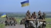 Колона українських військових на дорозі біля села Відродження неподалік Артемівська. 9 червня 2015 року
