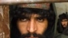 A suspected Taliban fighter in custody in northern Afghanistan (file photo)