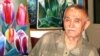 Темиртауский художник Гафур Тимерьянов среди своих картин.