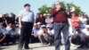 Жанболат Мамай и Болат Атабаев во время встречи с бастующими нефтяниками. Актау, июнь 2011 года.