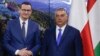 Polish Prime Minister Mateusz Morawiecki (left) and his Hungarian counterpart, Viktor Orban (file photo)