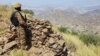 A Pakistani soldier stands guard at the Torkham crossing on the Pakistan-Afghanistan border.