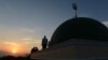 Indonesia -- Indonesian Muslims prepare to sight the new moon from the rooftop of the Al-Hidayah Basmol mosque in Jakarta on July 8, 2013 in preparation for the beginning of the Muslim holy fasting month of Ramadan.