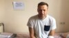 Navalny, Awaiting Appeal, Shares Suspicions He May Have Been Poisoned