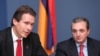 Armenia - Deputy Foreign Minister Zohrab Mnatsakanian (R) and Gunnar Wiegand, a senior EU official, at a joint news conference in Yerevan, 26Oct2011.