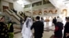 It is estimated that hundreds of Tajik women have entered into legally dubious temporary marriages with foreigners. (file photo)