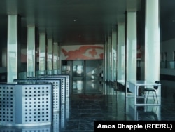 An empty security gate inside the building (May 2021)