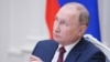 Vlagyimir Putyin egy konferencián Moszkvában 2021. november 30-án