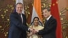Russian Foreign Minister Sergey Lavrov (L), Indian External Affairs Minister Sushma Swaraj (C), and Chinese Foreign Minister Wang Yi pose for a photograph ahead of a trilateral meeting in New Delhi on December 11. 