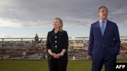 Russia -- Foreign Ministe Sergei Lavrov and US Secretary of State Hillary Rodham Clinton pose for a photo in St. Petersburg, 29Jun2012
