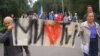 Residents of the Ukrainian city of Dnipropetrovsk rally in support of embattled TVi on September 8.