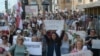 Belarusian teachers attend a rally in support of the opposition, against police brutality and the results of the presidential election in Minsk on August 14.