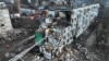 Surat Russiýanyň Ukrainanyň Poltawa şäherine uran raketa zarbasynyň netijesini görkezýär.