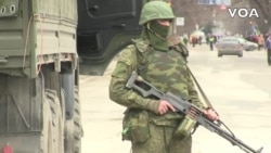 Soldiers In Unmarked Uniforms Patrol In Crimea