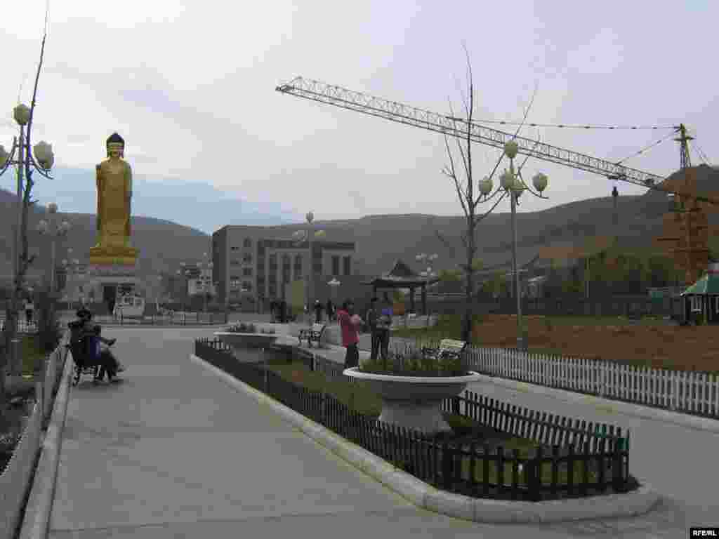 A newly built, 23-meter-high Golden Buddha gleams in a park on the southern tip of Ulan Bator. - Mongolia has sought to resurrect its Buddhist heritage following years of communist repression.