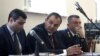 Armenia -- Prosecutor-General Artur Davtian (C) and two other prosecutors at the opening session of former President Robert Kocharian's trial in Yerevan, May 13, 2019.