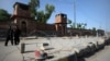 Peshawar's Central Prison, where Afridi is doing his time in an isolated cell, stands on a busy main road in the heart of the city.