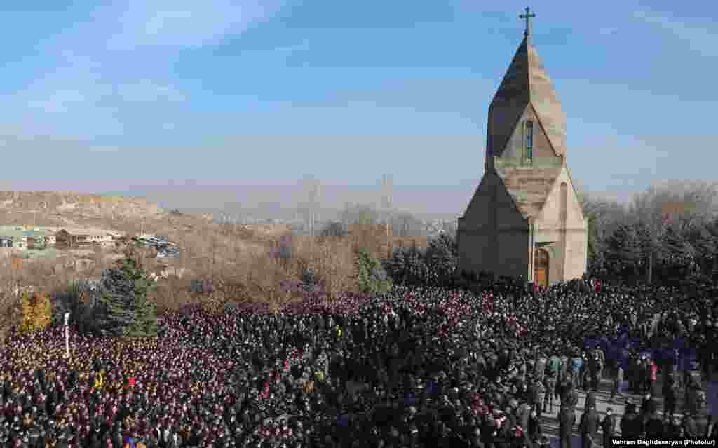 A black-clad crowd masses at Yerevan's Yerablur military cemetery on December 19. Nearly 3,000 Armenians were killed in the conflict out of a population of 3 million. 