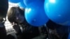 Один из активистов Либертарианской партии России, задержанный на акции 10 марта, в автозаке