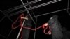 Iranian security officer prepare a hanging rope for an execution. (file photo) 