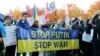 Акция протеста в Берлине накануне саммита "нормандской четверки"