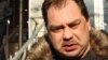 Оппозиционный политик Михаил Сизов в день суда по закрытию партии «Алга». Алматы, 5 декабря 2012 года. 