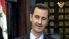 Syria -- A TV grab shows President Bashar al-Assad speaking during an interview with al-Manar in Damascus, 30May2013