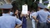 Armenia - Activists protest outside a police building in Yerevan against the criminal investigation into deadly violence at the Harsnakar restaurant, 9Aug2012.
